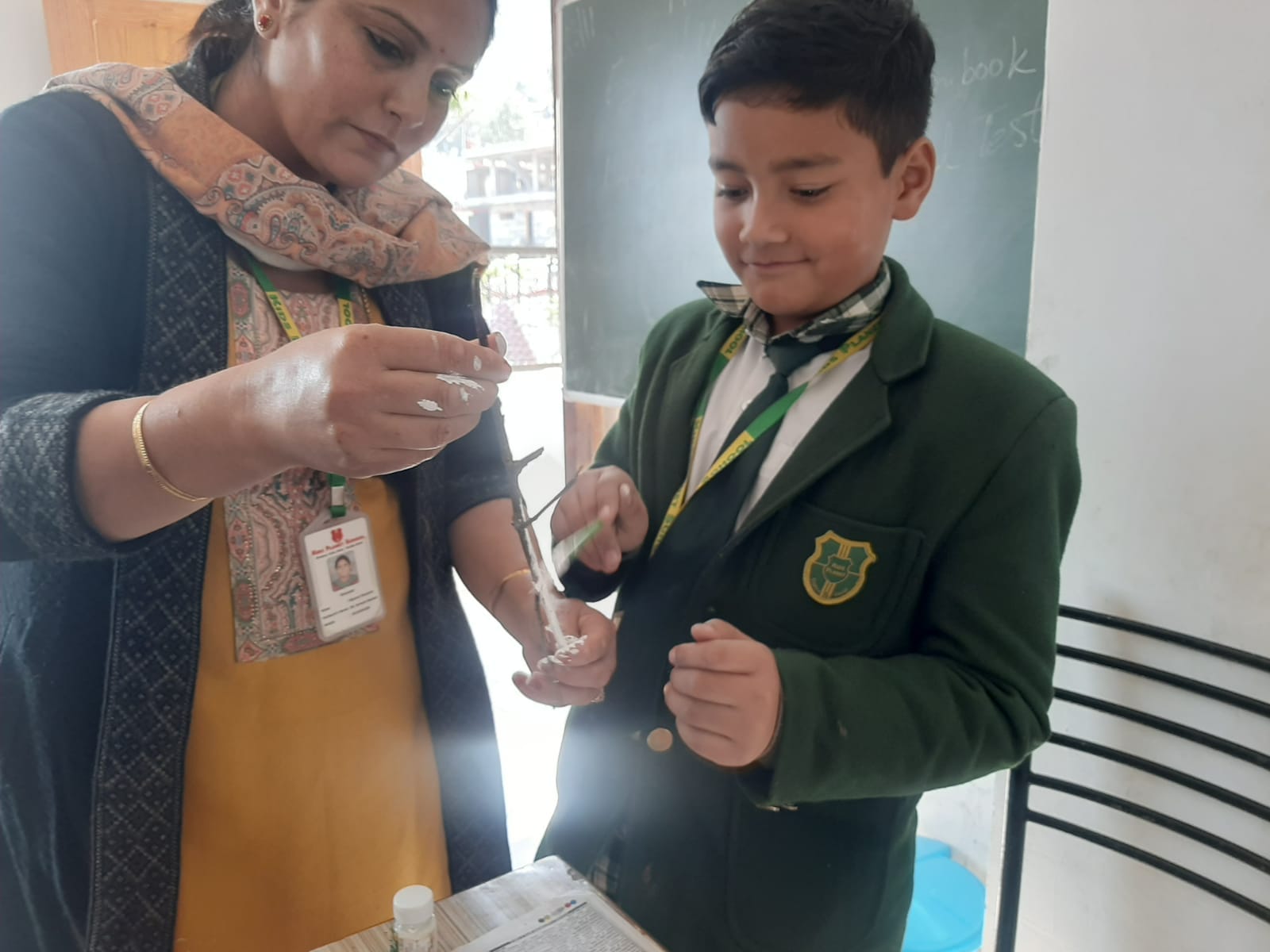 Hands-on science experiment with teacher guidance