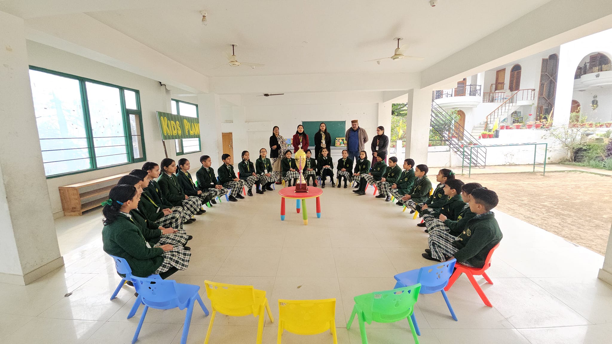 Students seated in a circle for group discussion