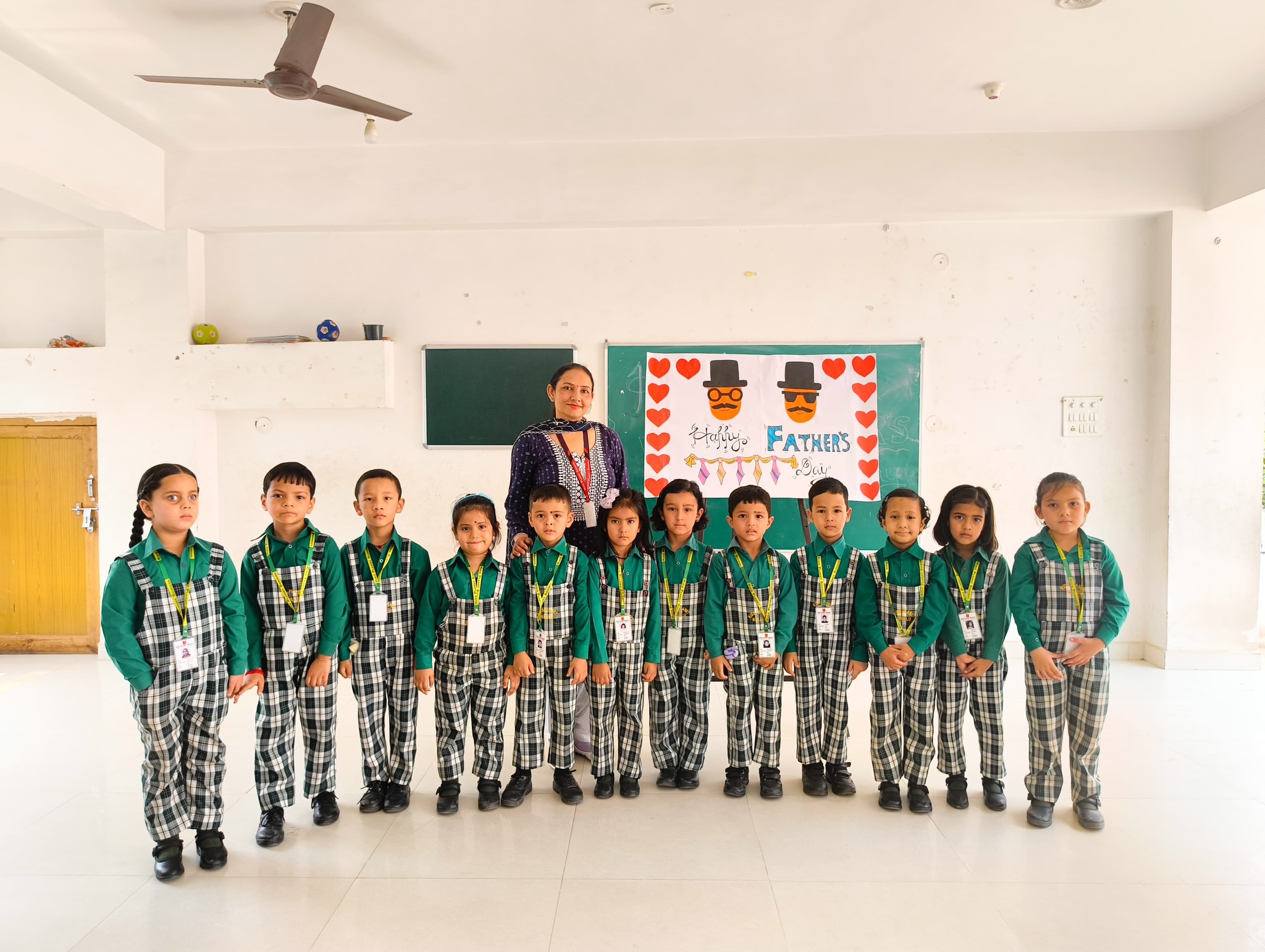 Class group photo with teacher on Father's Day