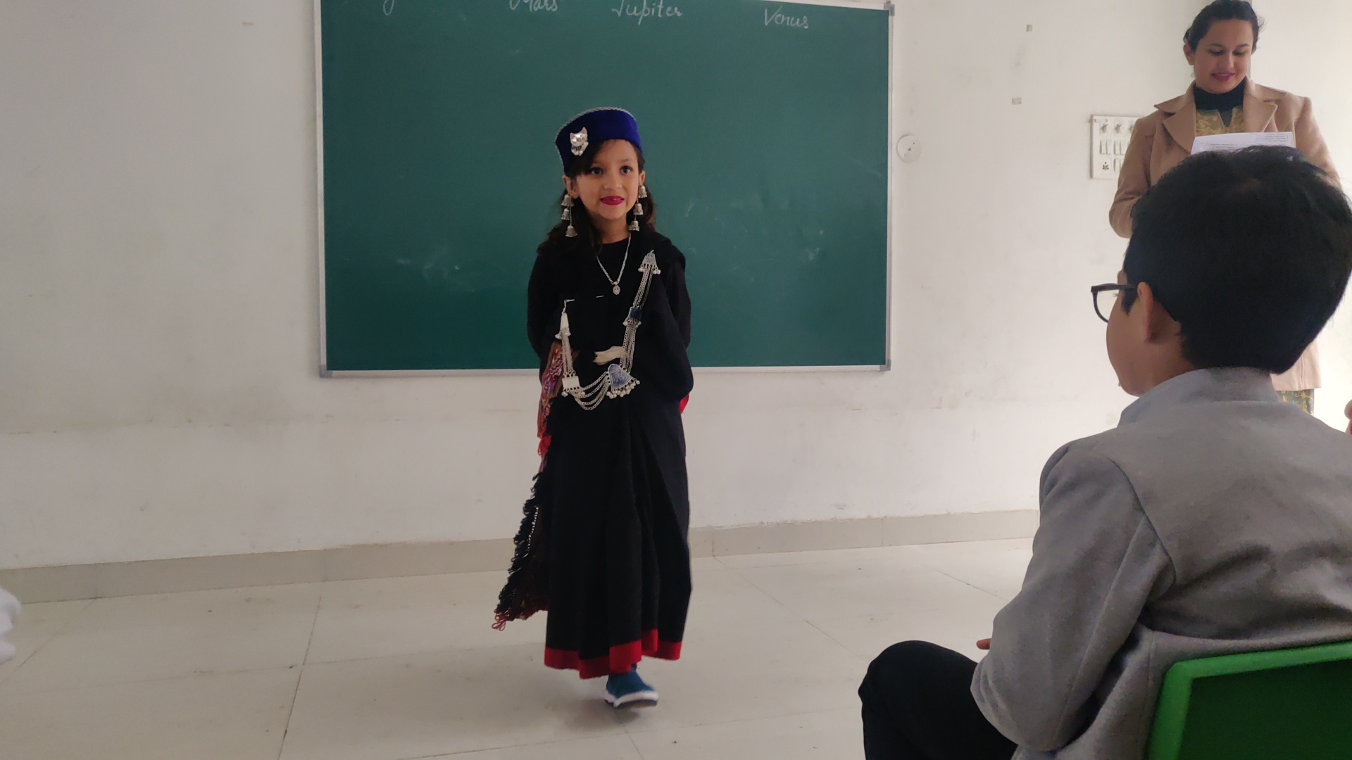 Student performing in traditional Himachali dress