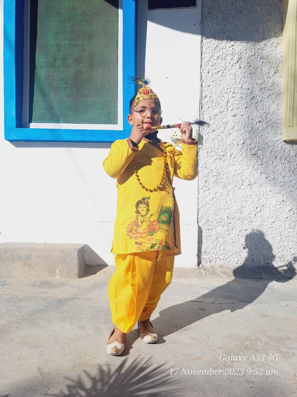 Fancy dress competition — child dressed as Lord Krishna