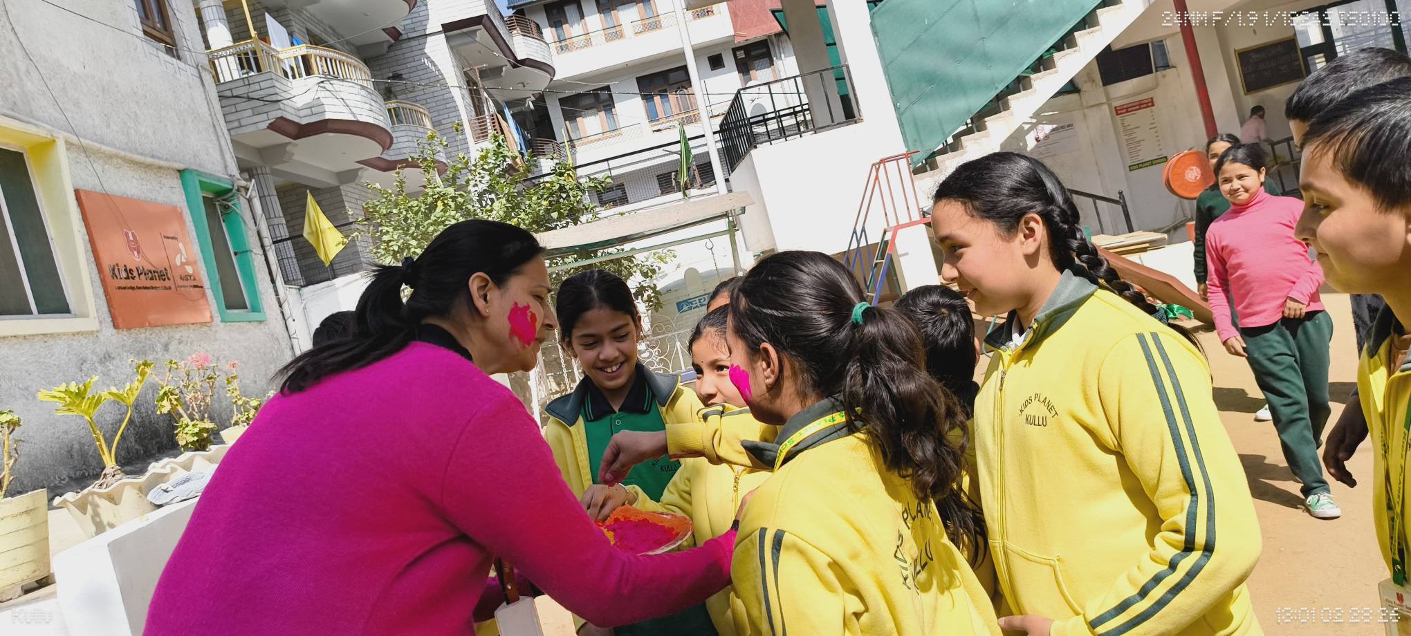 Holi outdoor celebrations with students and teachers