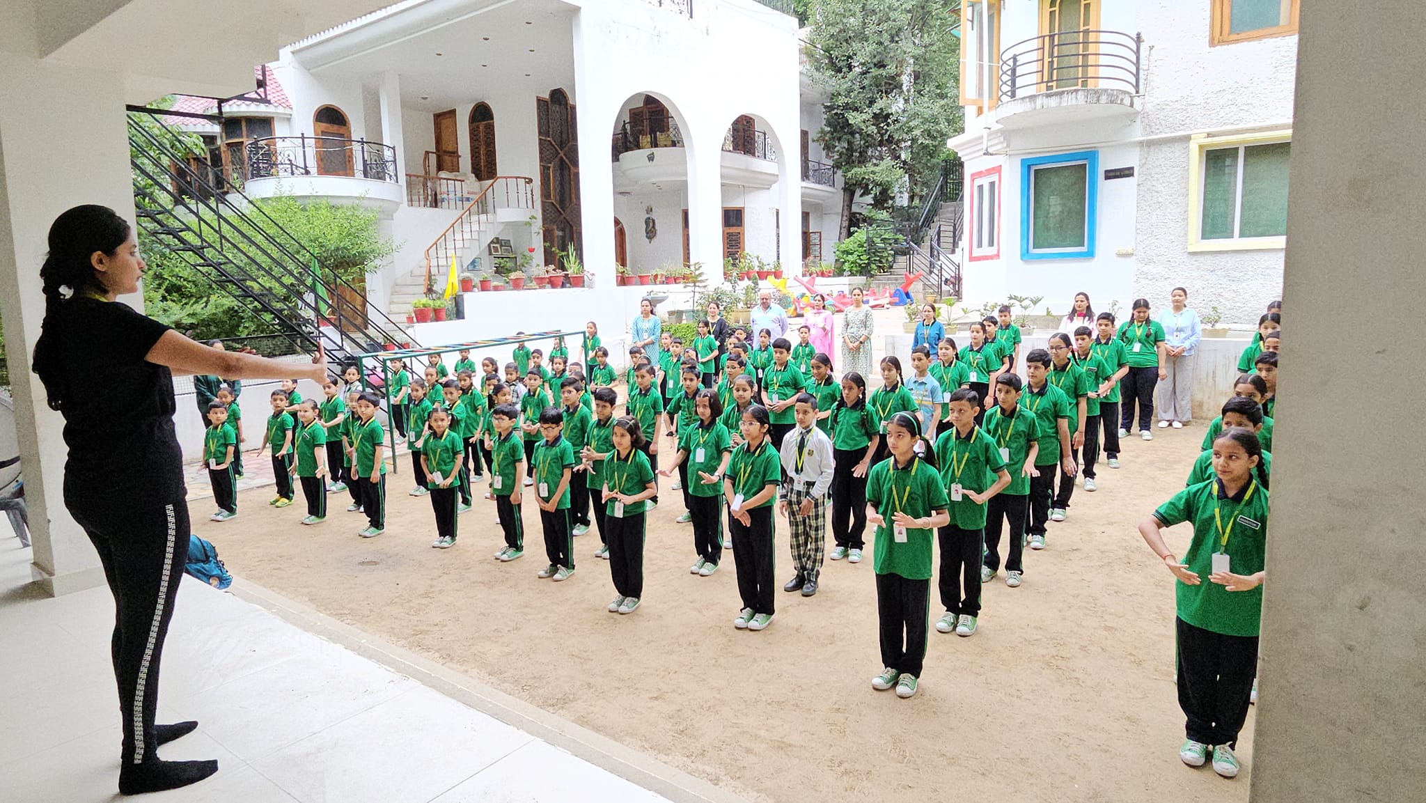 Morning exercise and yoga session in the school courtyard